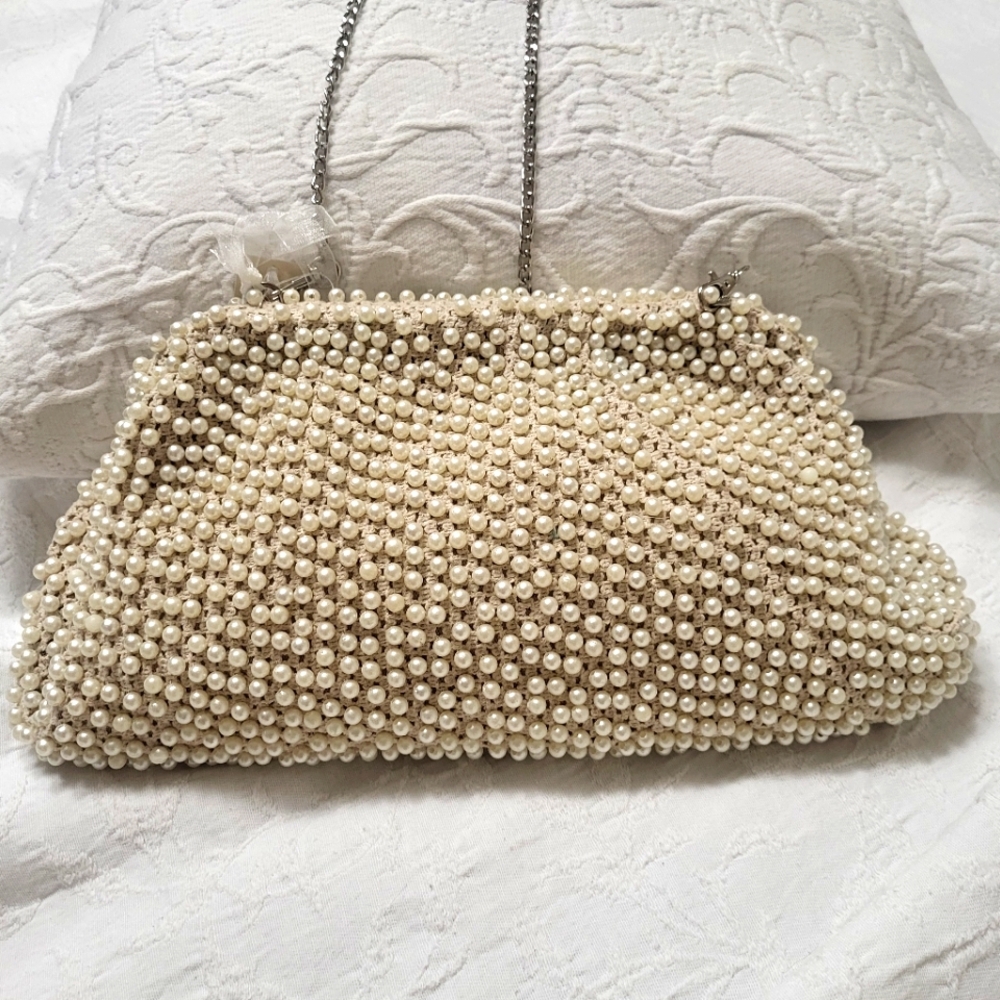 Elegant Cream Beaded Clutch with Curved Frame